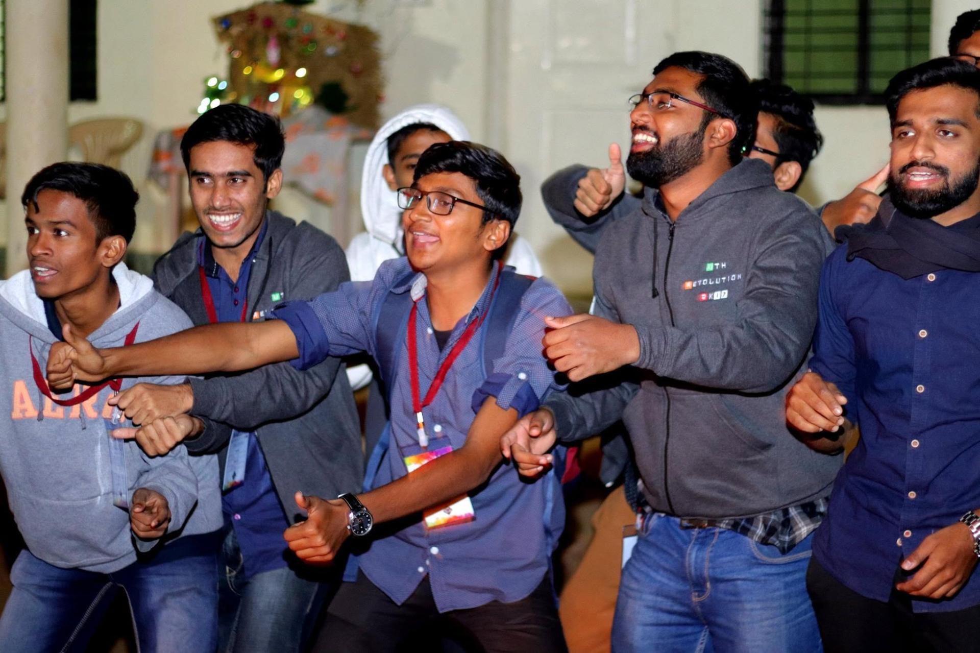 ICPF Pune students cheering together at a fellowship event